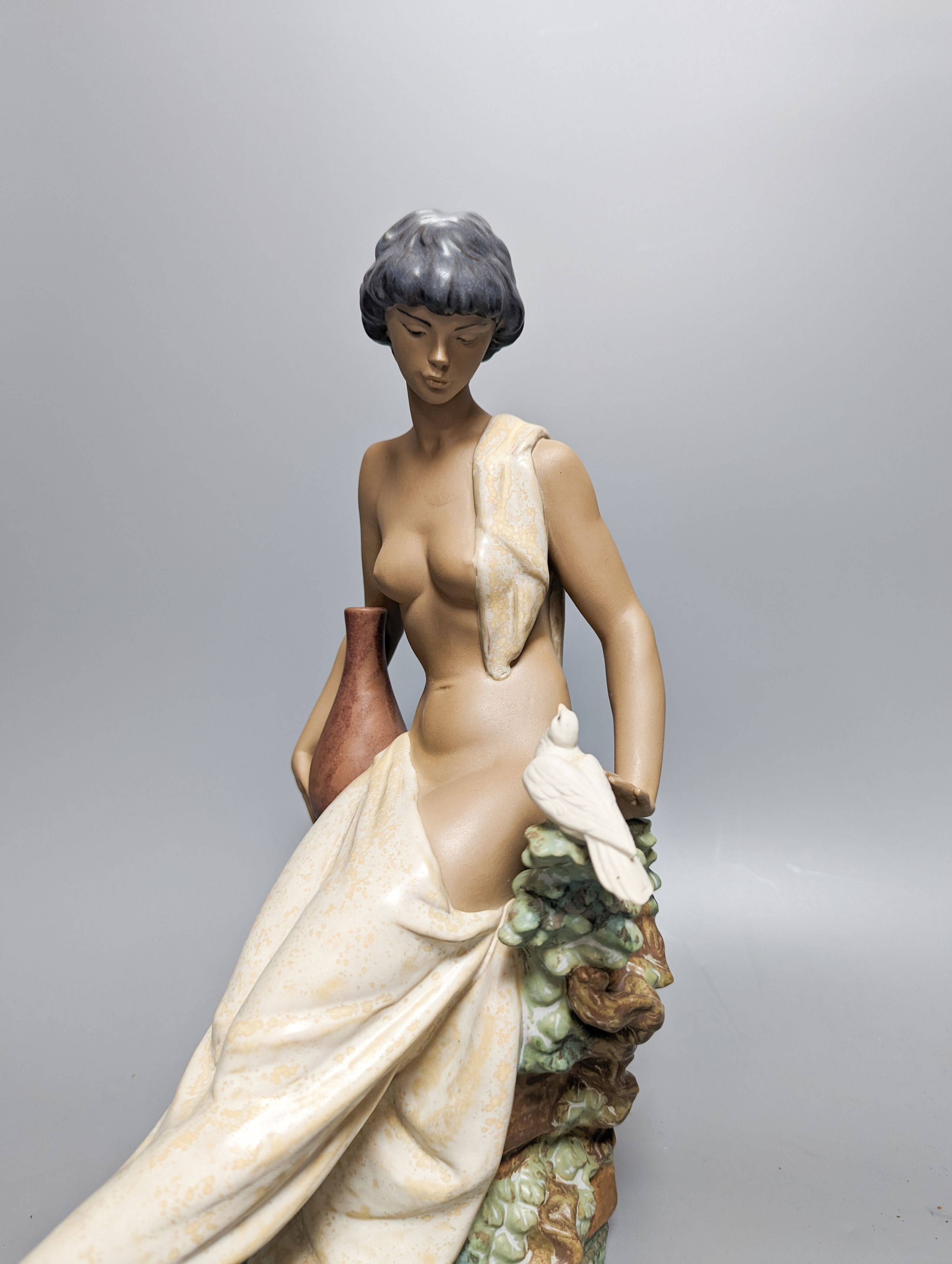 A Lladro stoneware figurine ‘Solitude’, Height 34cm. Width 25cm.